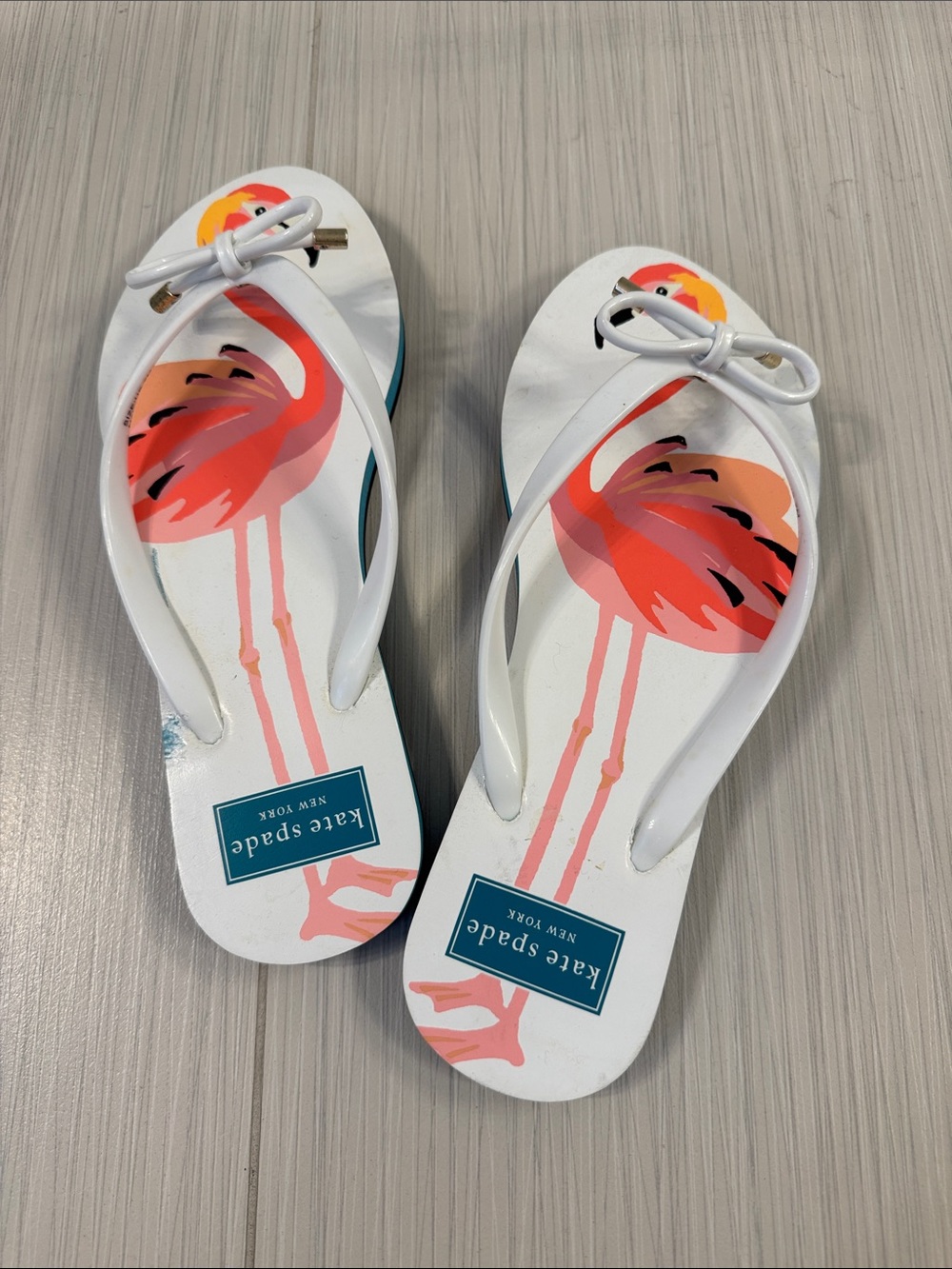 kate spade White Flip Flops with Pink & Coral Flamingo Print